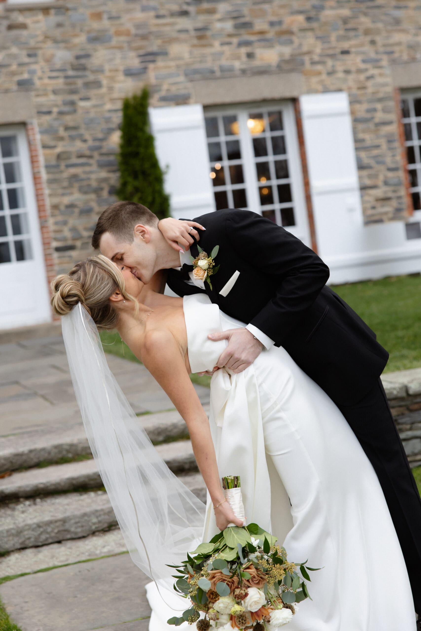 couple kissing after ceremony at shepherds run