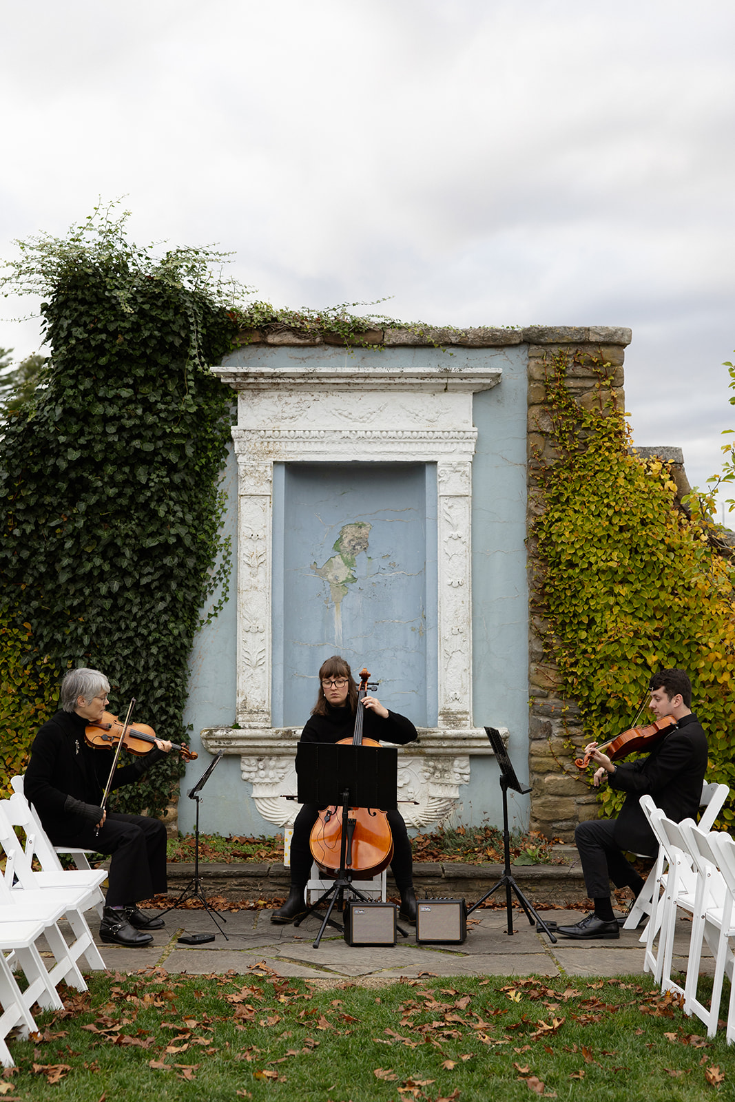 String trio playing live music during an outdoor wedding ceremony at one of the romantic Wedding Venues in Rhode Island.
